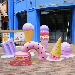 Гигантская скульптура пончика из стекловолокна для свадебного декора "Candyland"