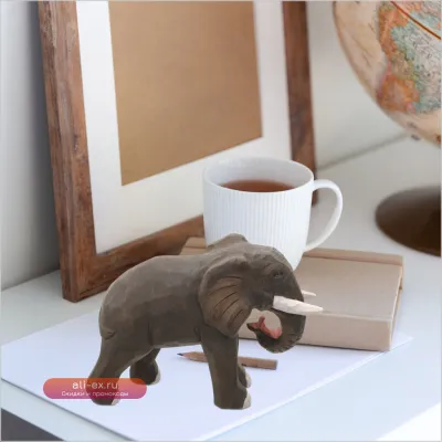 Резная скульптура слона из дерева: натуральный декор для рабочего стола и дома