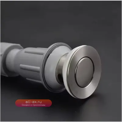 Тёмно-серый донный слив для раковины в современном дизайне с выдвижным механизмом